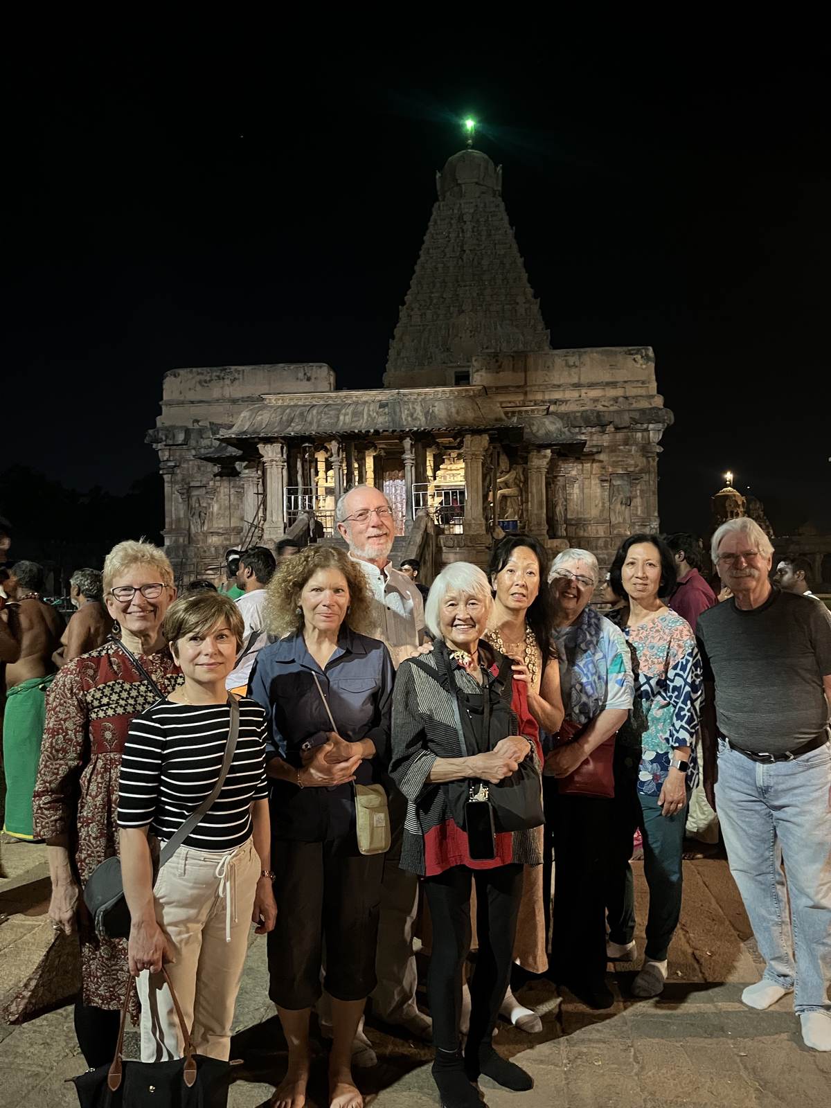 A Bout India group at a temple at night, Thanjavur