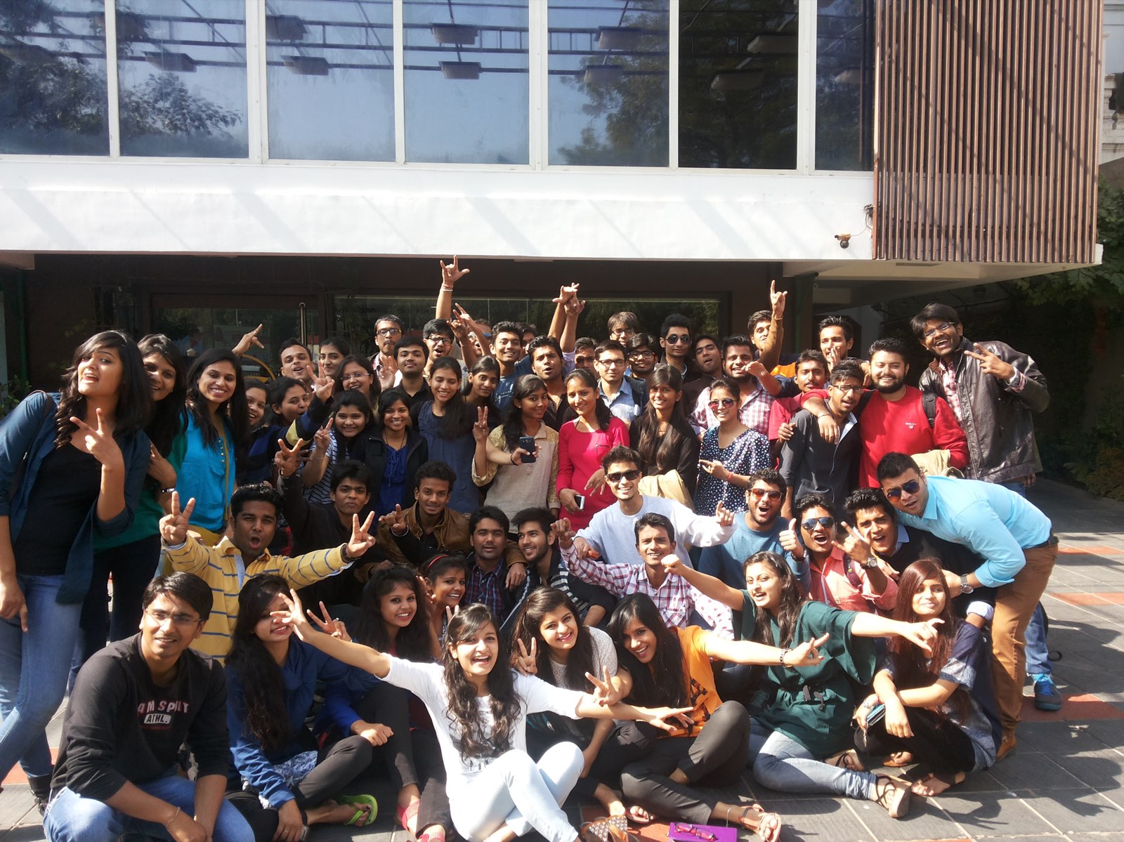A large Bout India group outside an office in India